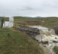 A man is standing next to a white object in a field. AI generated content